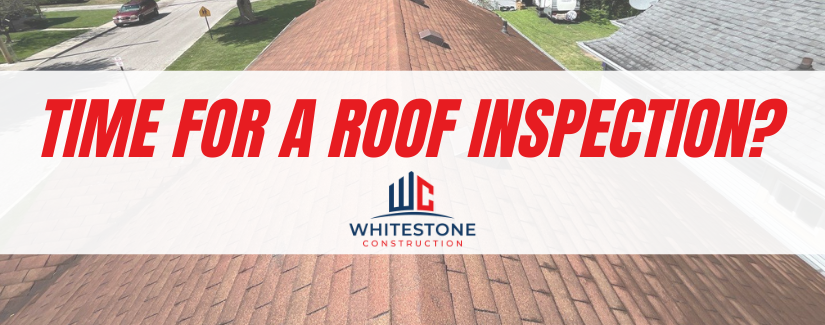 Roof with a message asking if it's time for a roof inspection by Whitestone Construction.